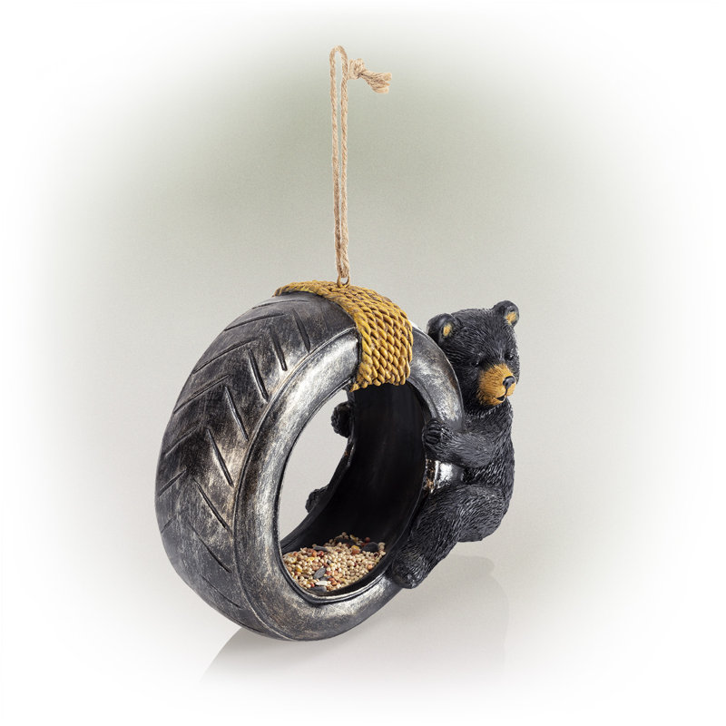 Loon Peak® Shoup Bear Swinging on Tire Decorative Bird Feeder & Reviews